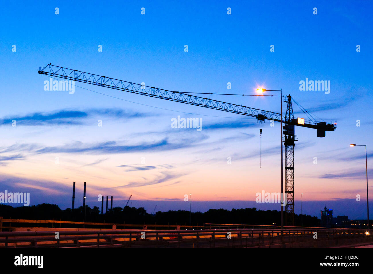 Crane at night Stock Photo Alamy