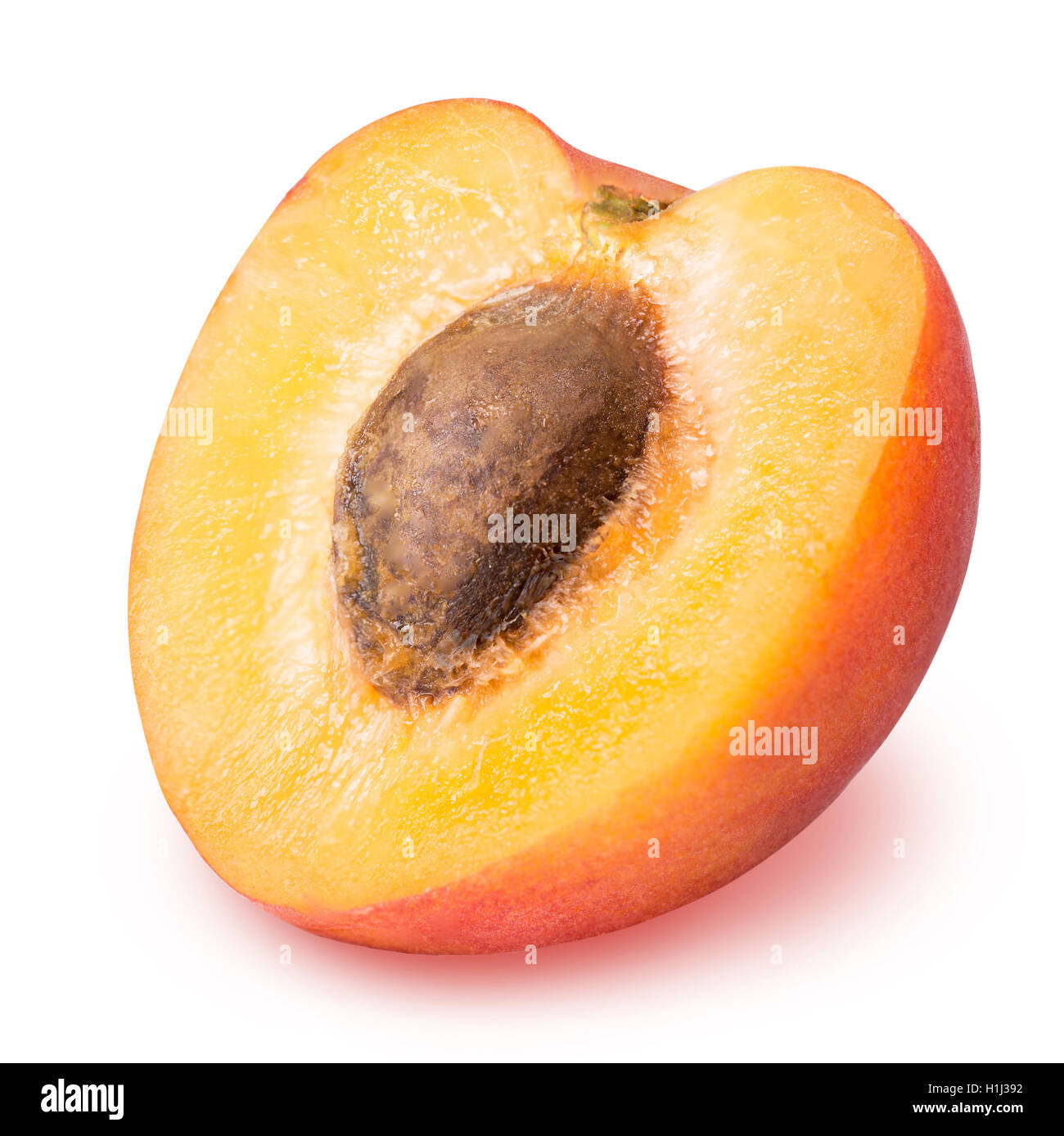 half ripe apricot isolated on a white background clipping path Stock ...