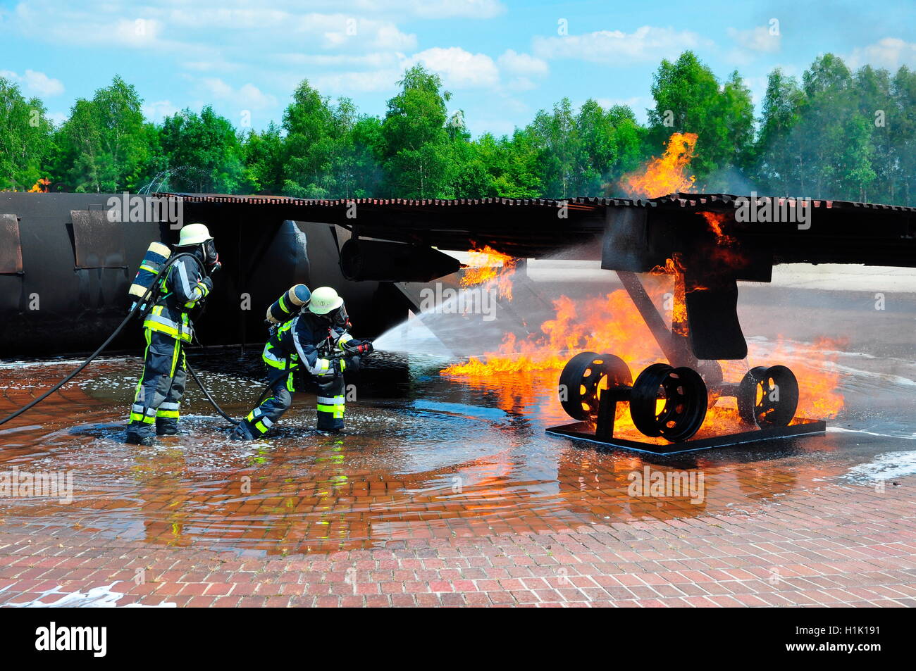 training, firefighting, fire brigade, mock-up airplane, airport rescue and firefighting services, Munich, Bavaria, Germany Stock Photo