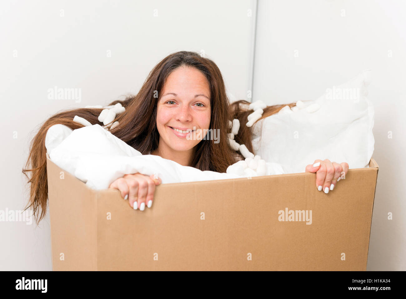 Female worker packing box in warehouse hi-res stock photography and ...