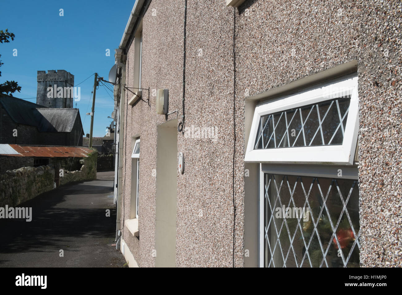 Pebble dashed walls of terraced houses,cottages in centre of hilltop