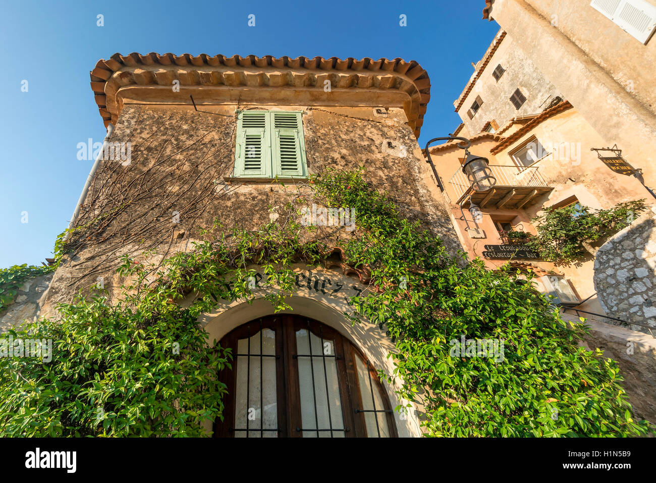 Jasmine covered entryway, Eze Village, Historic town, Medieval Village, Eze, Provence-Alpes-Cote d’Azur, France Stock Photo