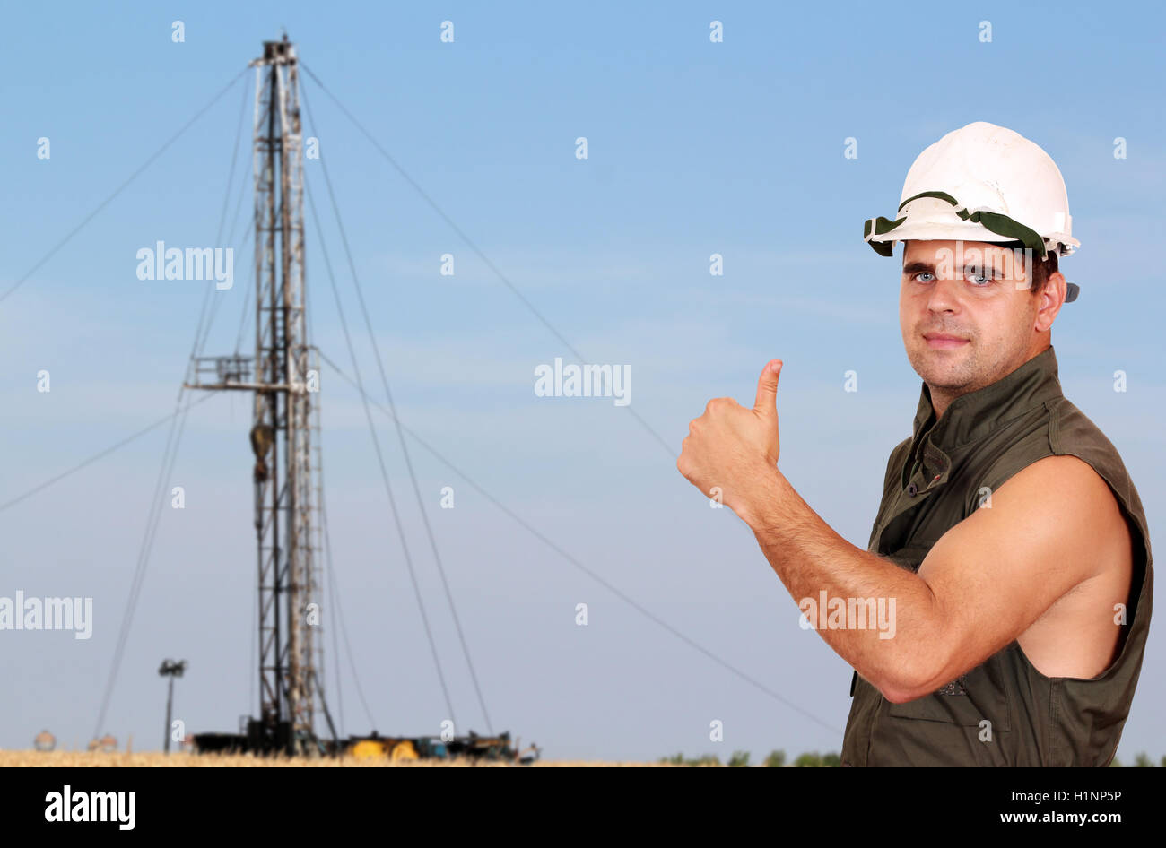 oil worker with thumb up Stock Photo