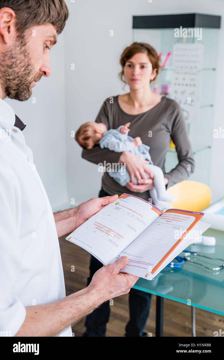 Medical consultation of a 3 month old baby girl. Stock Photo