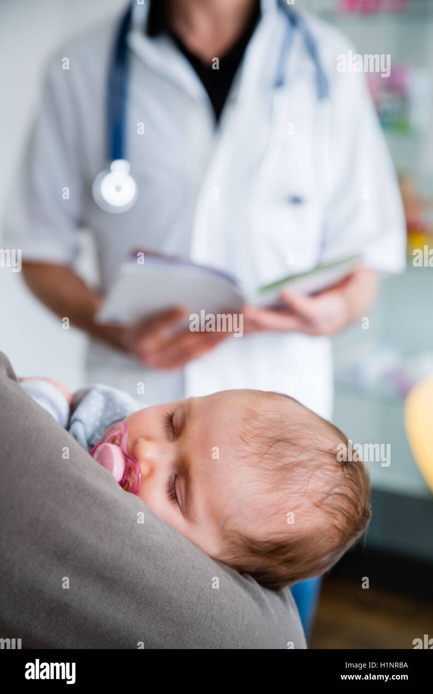 Medical consultation of a 3 month old baby girl. Stock Photo