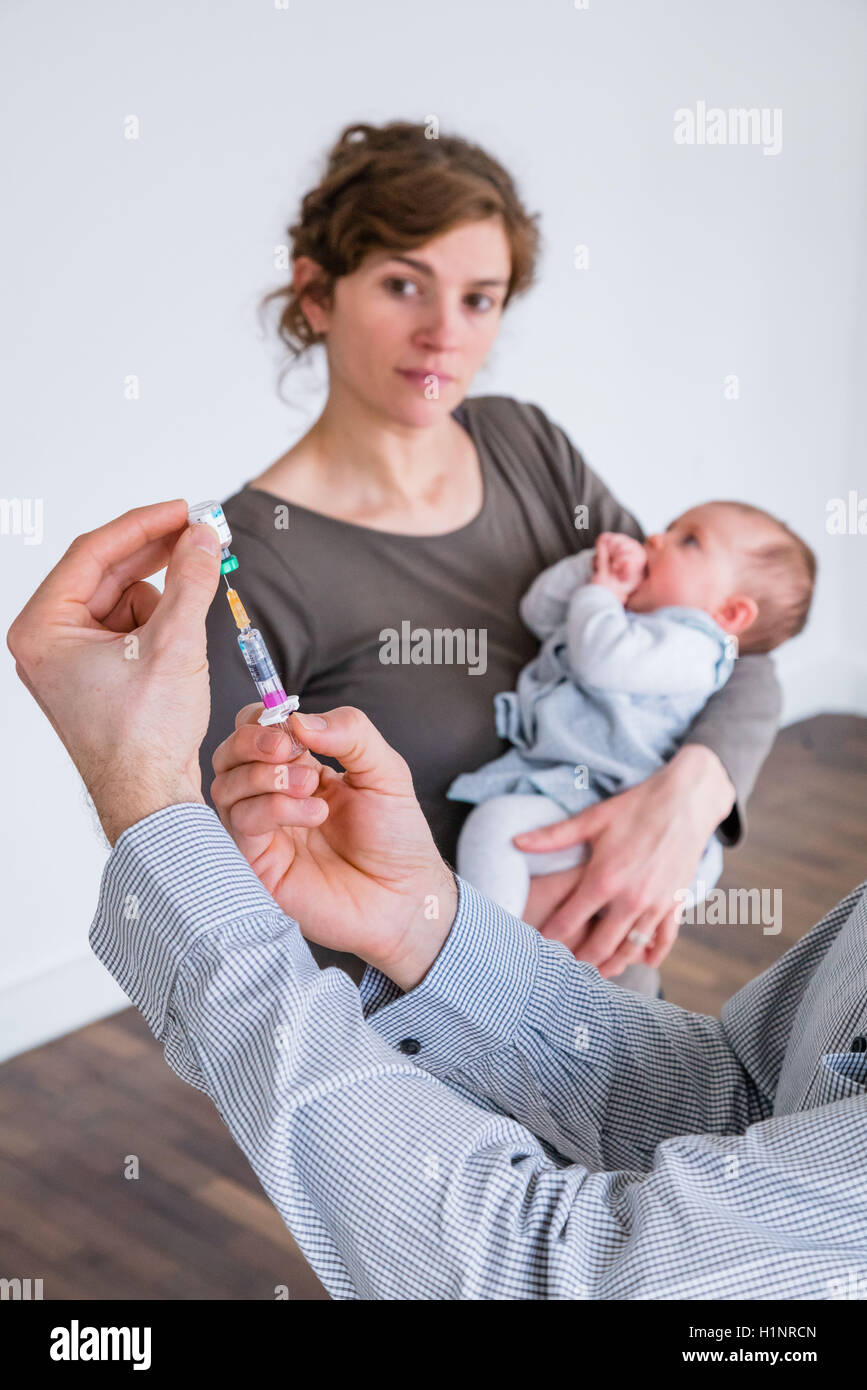 3 month old baby receiving vaccination Stock Photo - Alamy