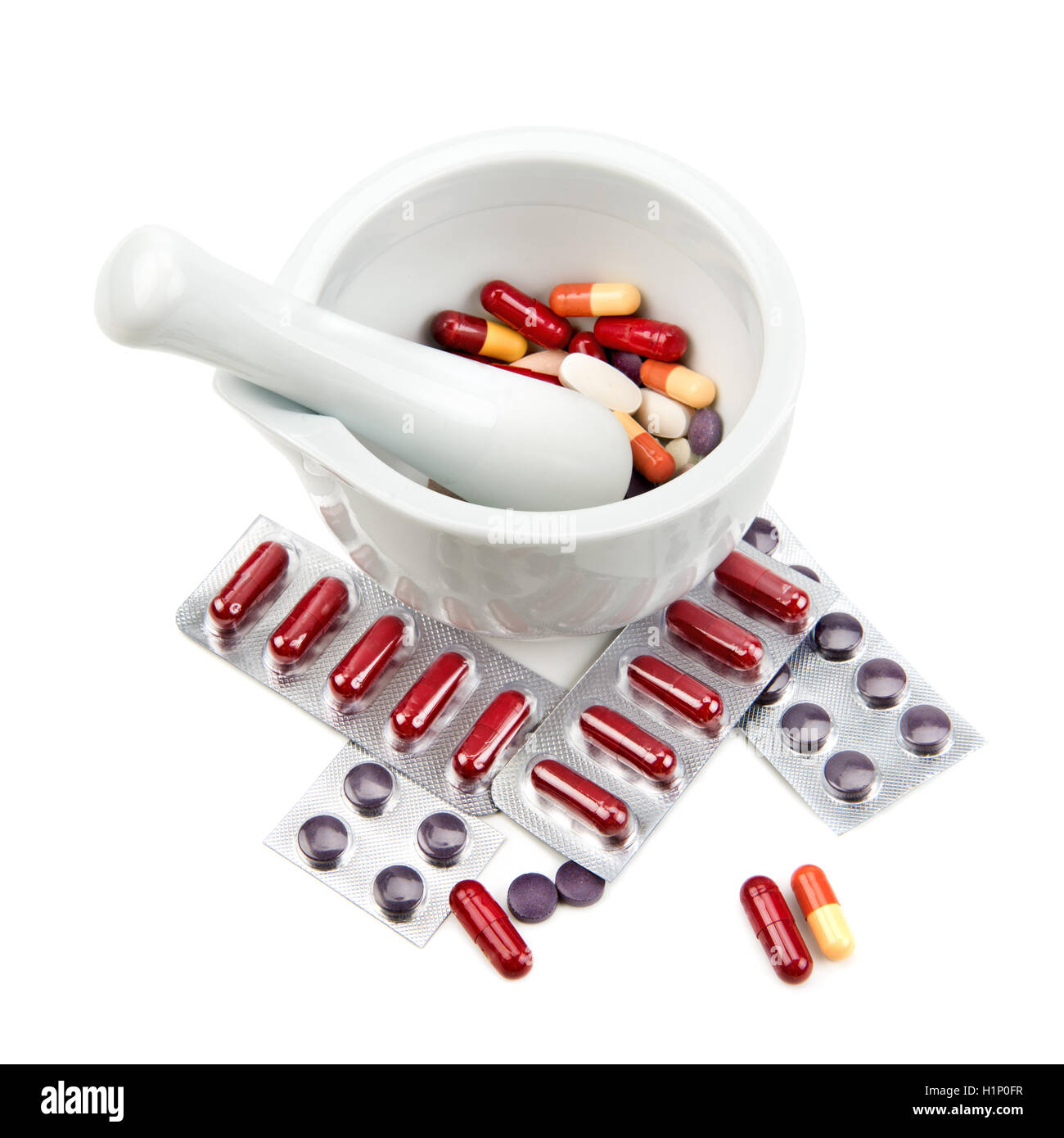 mortar . pestle and pills isolated on white background Stock Photo