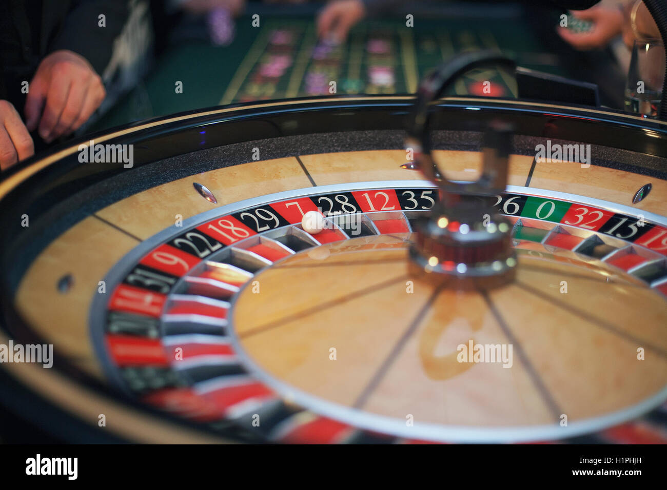 Roulette wheel in casino lucky seven wins Stock Photo Alamy