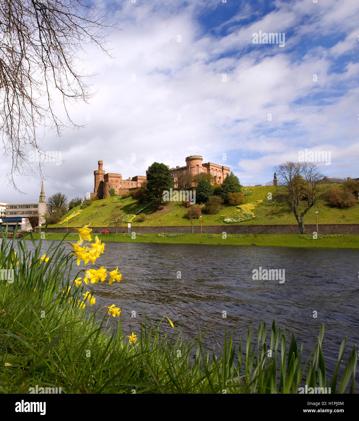 Spring view across the river Ness towards Inverness Castle, Inverness, Highlands. Stock Photo