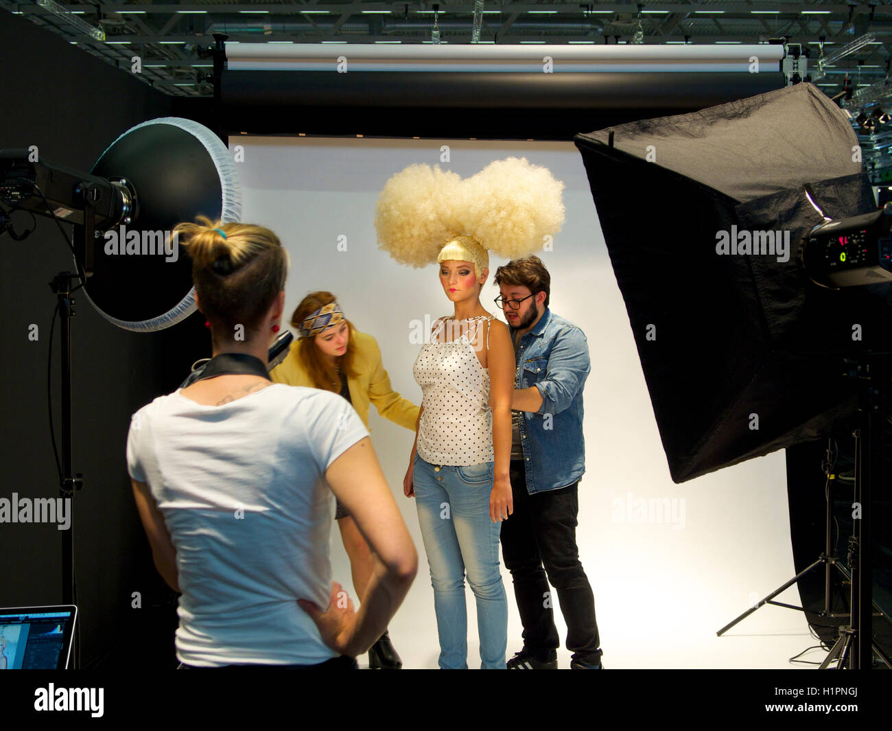 Creative team working on a fashion shoot in the photo studio, Cologne, Germany Stock Photo