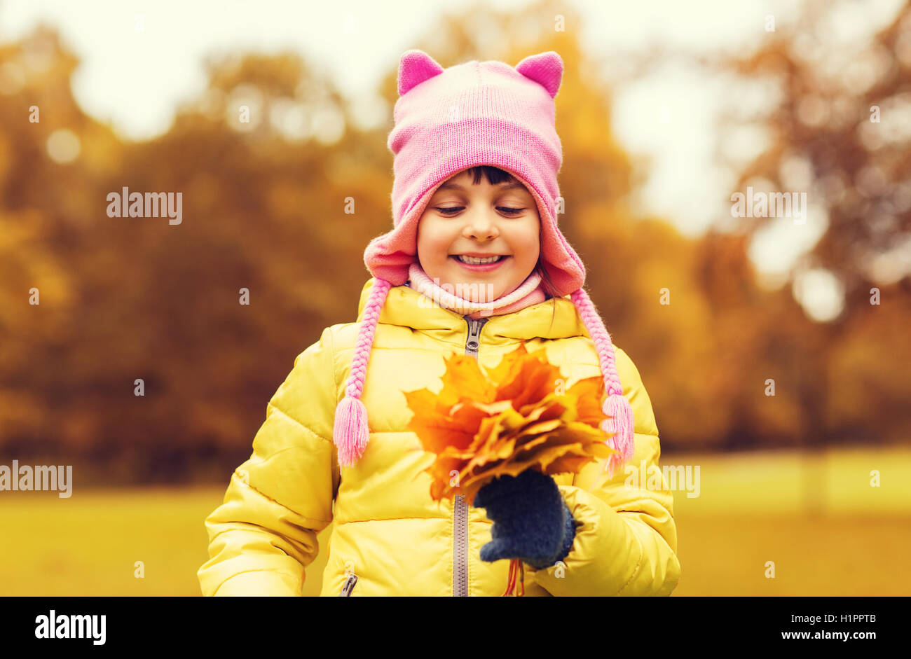 happy beautiful little girl portrait outdoors Stock Photo - Alamy