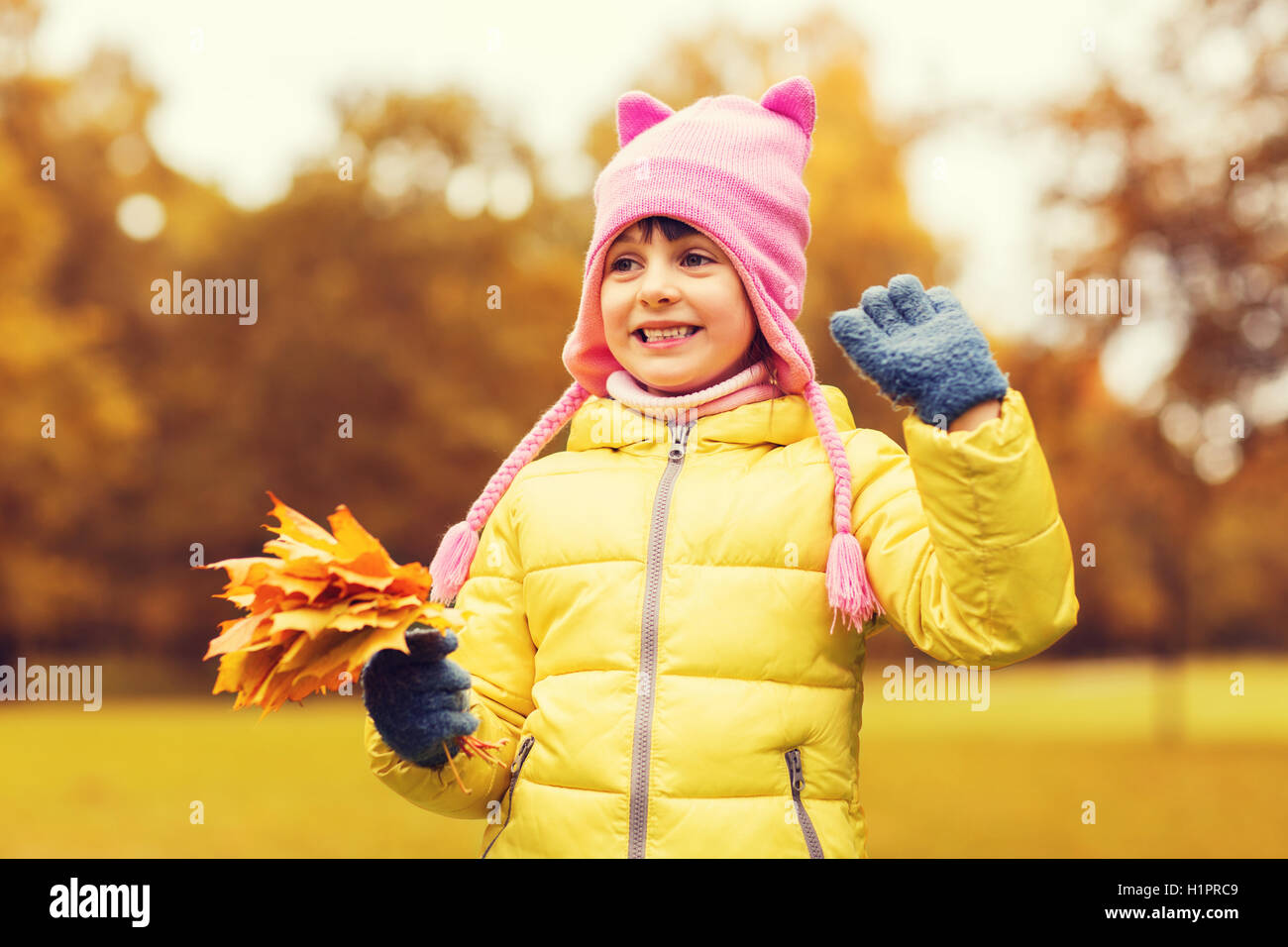 happy beautiful little girl portrait outdoors Stock Photo - Alamy