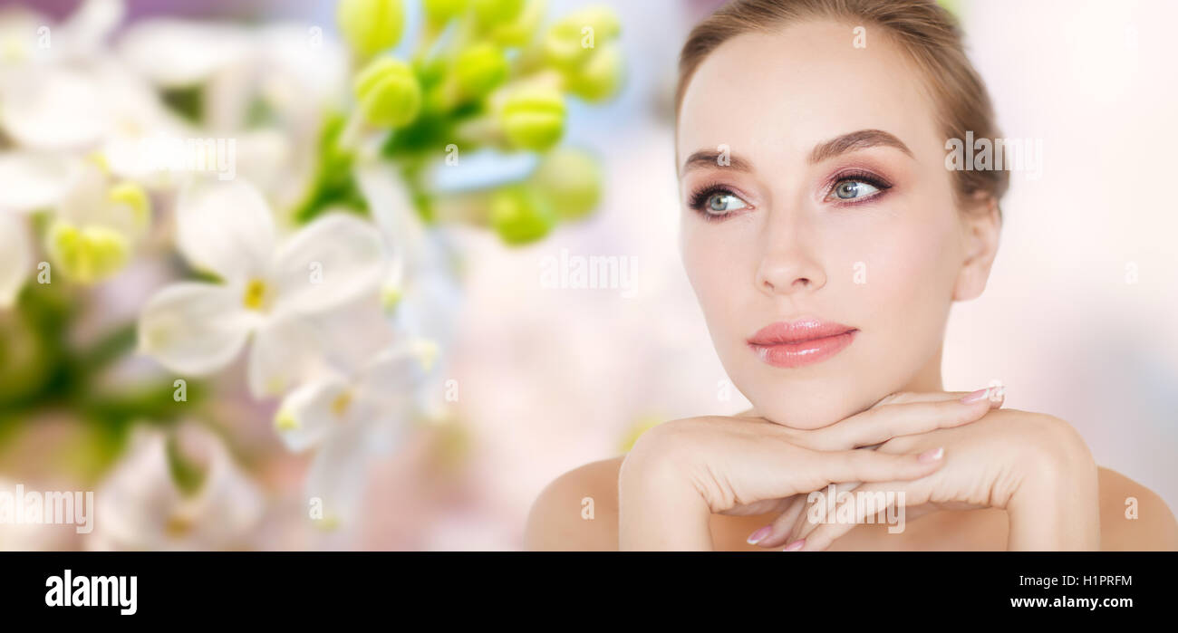 beautiful young woman face and hands Stock Photo - Alamy