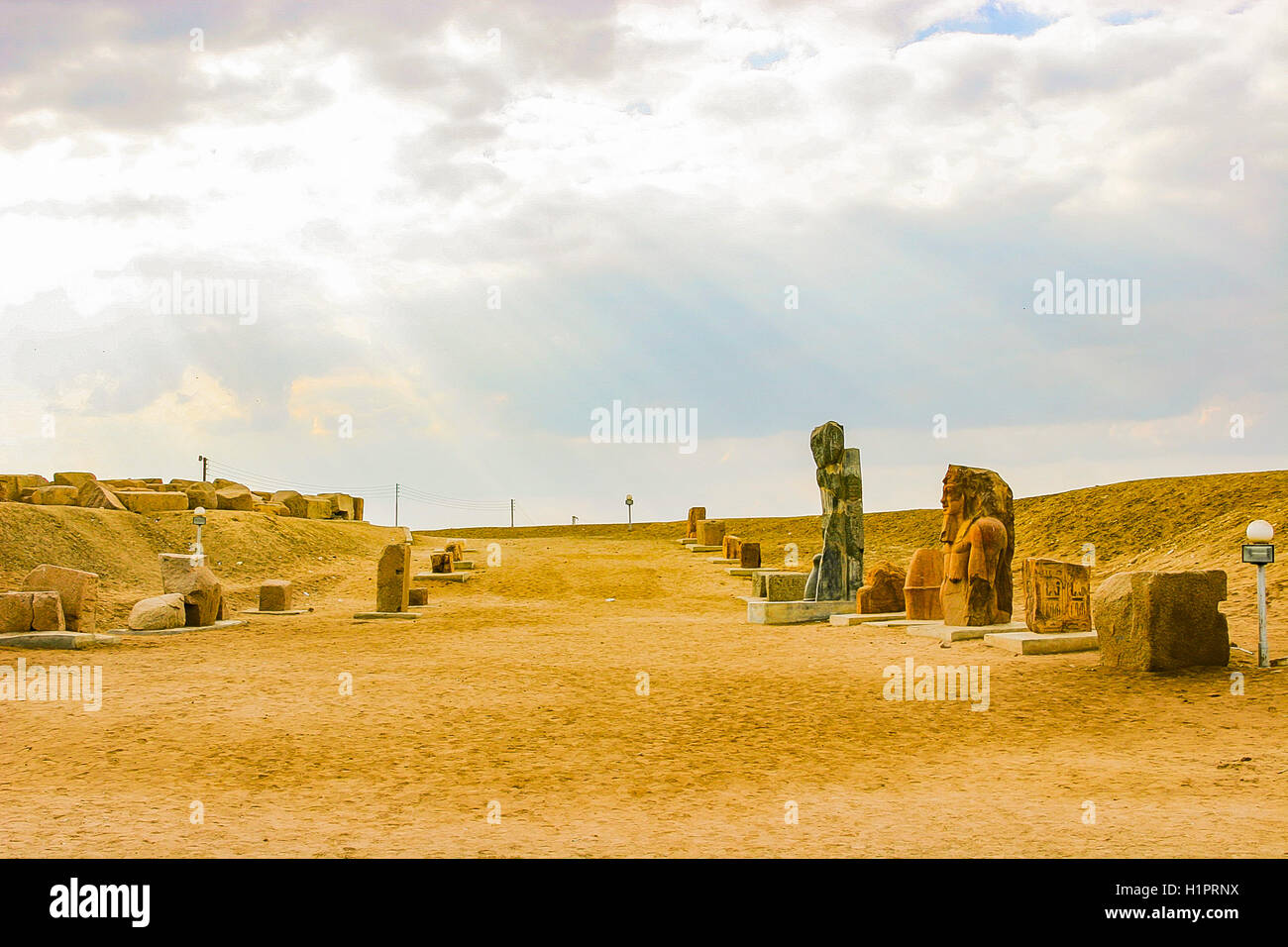 Egypt, Nile Delta, Tanis, modern processional way to the temple, with reliefs and statues on display. Stock Photo