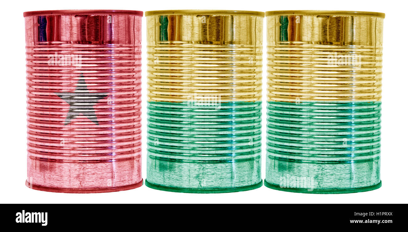 Three tin cans with the flag of Guinea-Bissau on them isolated on a white background. Stock Photo