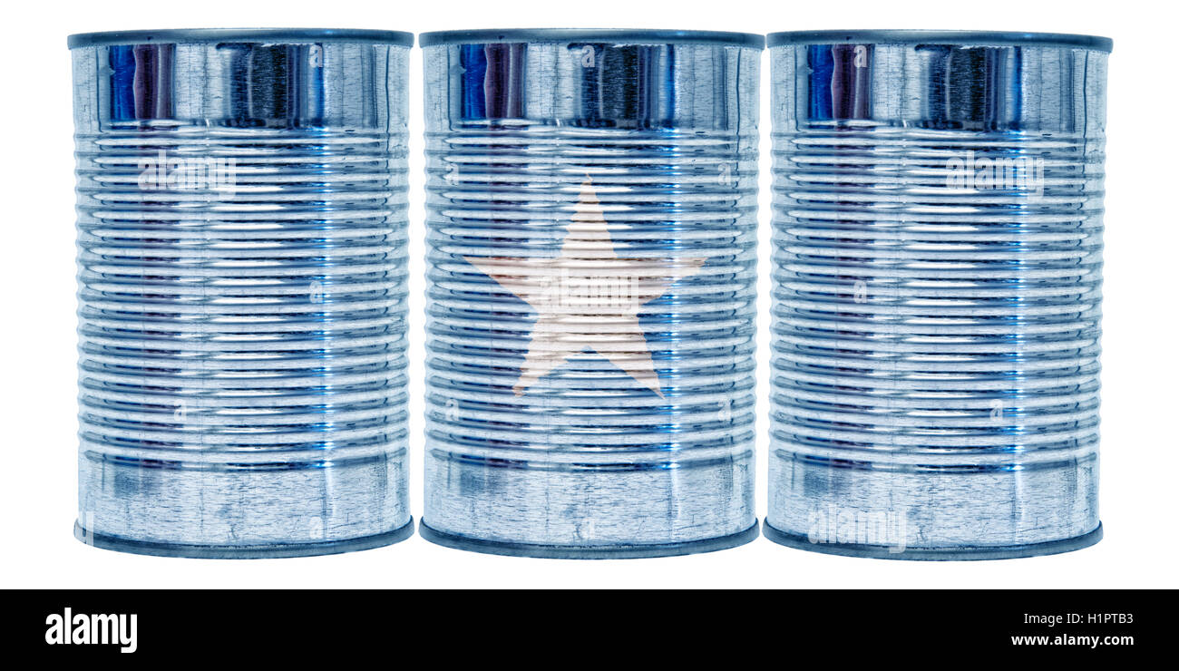 Three tin cans with the flag of Somalia on them isolated on a white background. Stock Photo