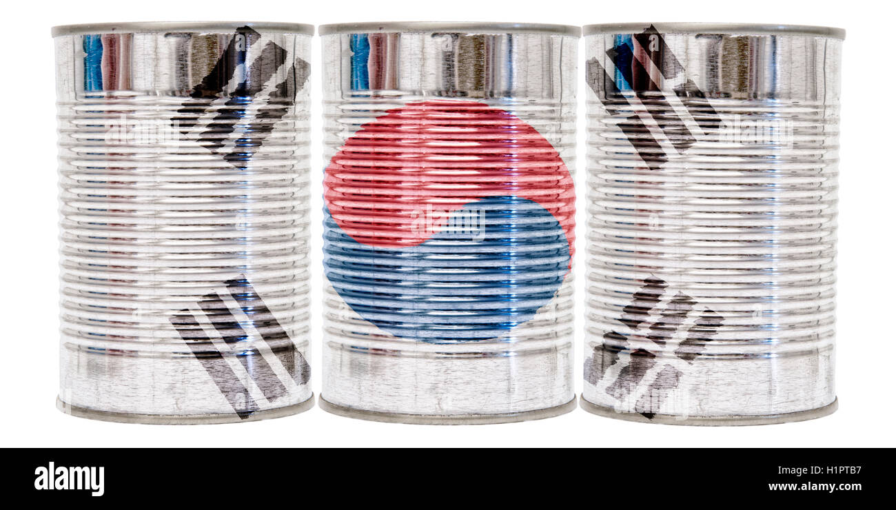 Three tin cans with the flag of South Korea on them isolated on a white background. Stock Photo