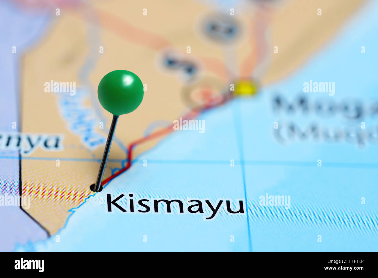 Kismayu pinned on a map of Somalia Stock Photo