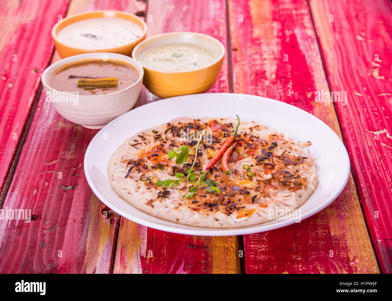 South Indian Food Uttapam or ooththappam or Uthappa is a dosalike dish