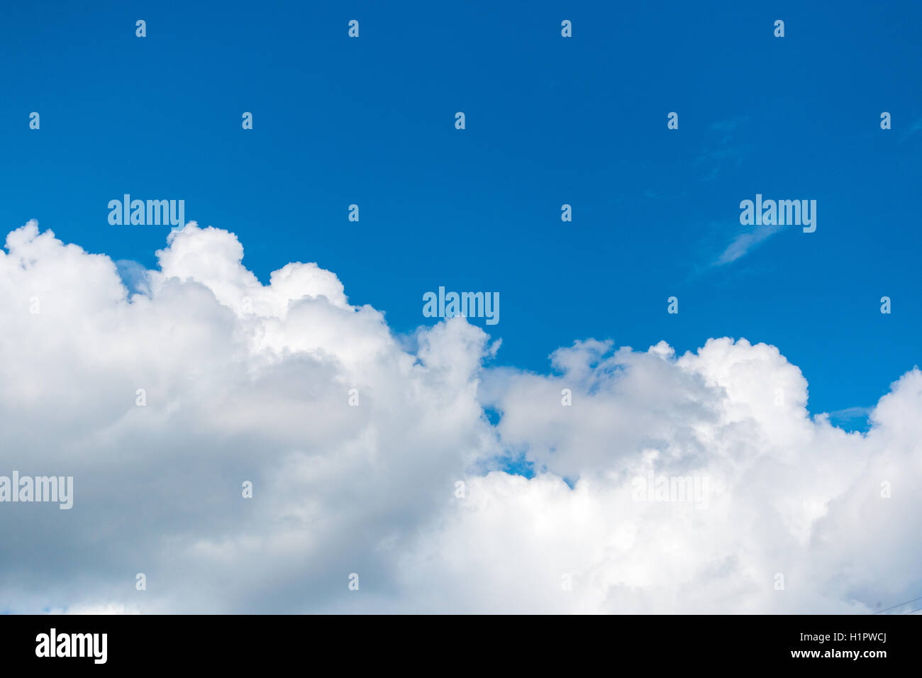 thick white cloud in the blue sky Stock Photo - Alamy
