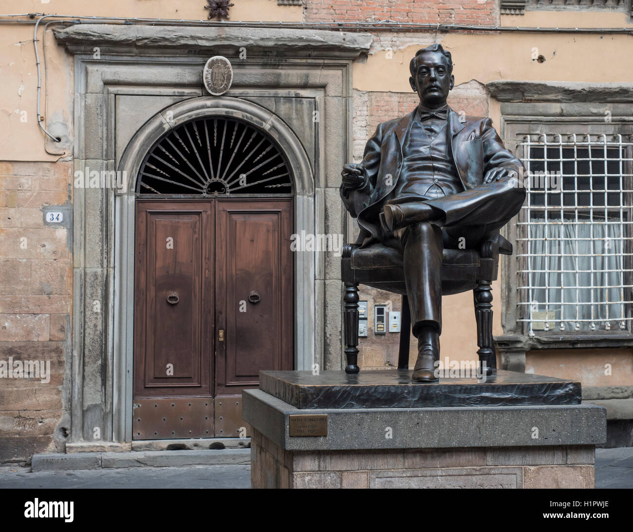 Bronze statue of composer Giacomo Puccini in his birthplace, Lucca, Tuscany, Italy Stock Photo
