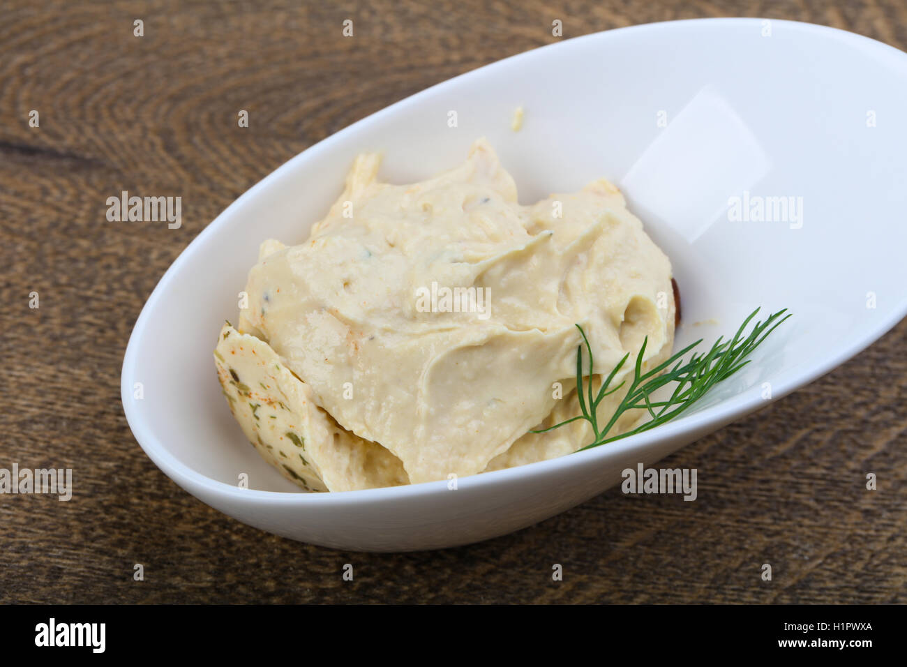 Arabic traditional cusine hummus with dill and cedar nuts Stock Photo