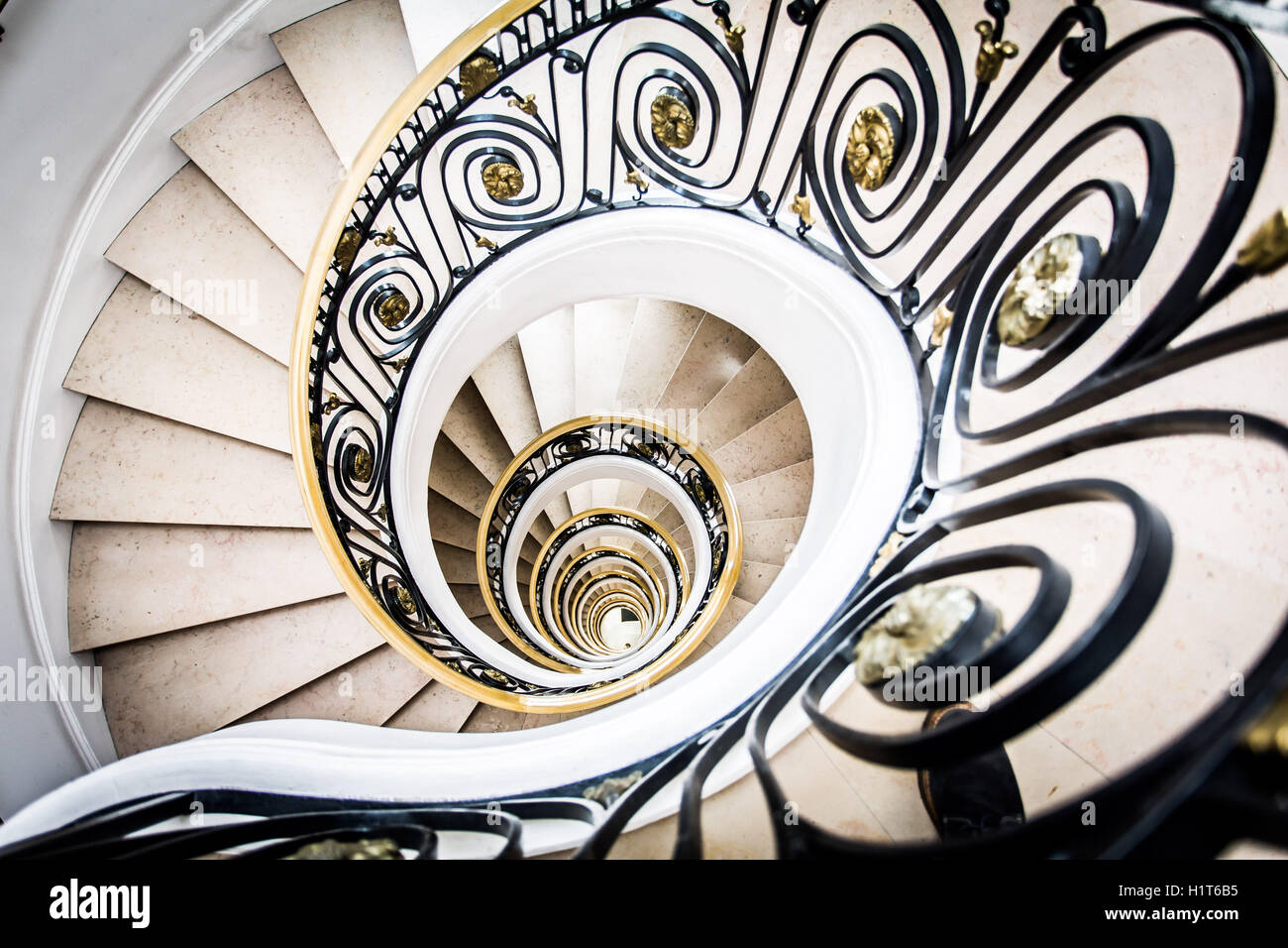 Looking down a spiral staircase. Stock Photo