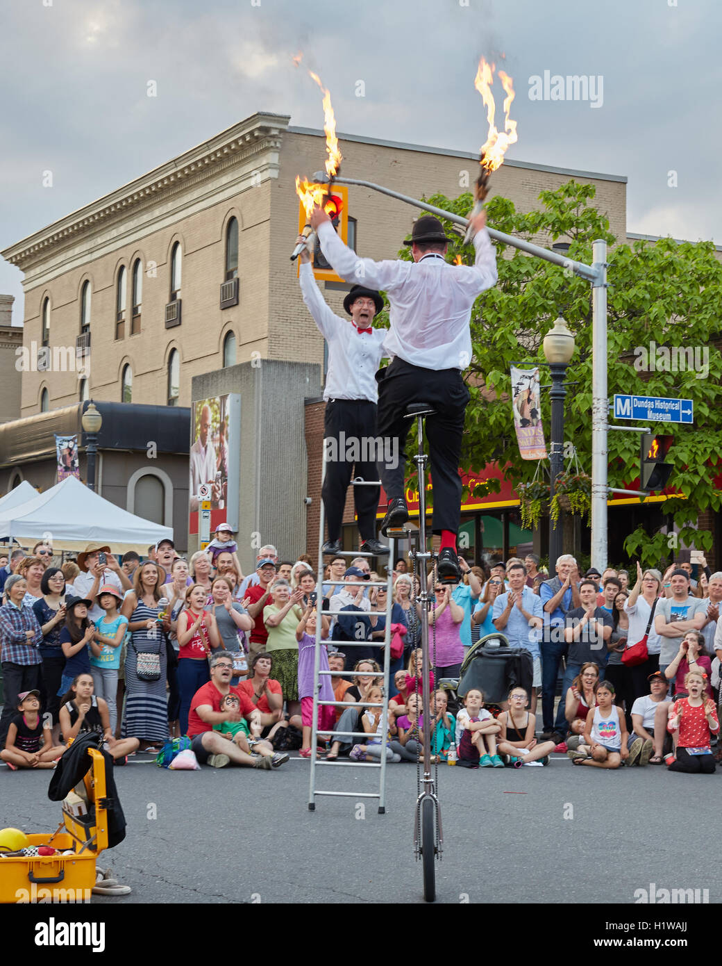 Street performers at busker festival Stock Photo - Alamy