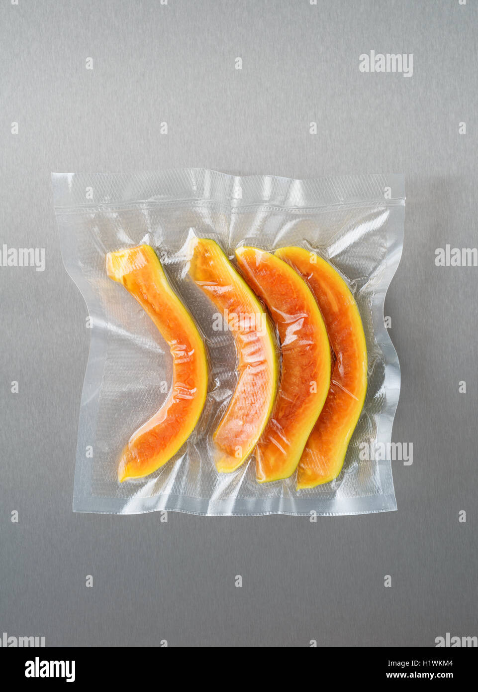 Vacuum sealed papaya Stock Photo