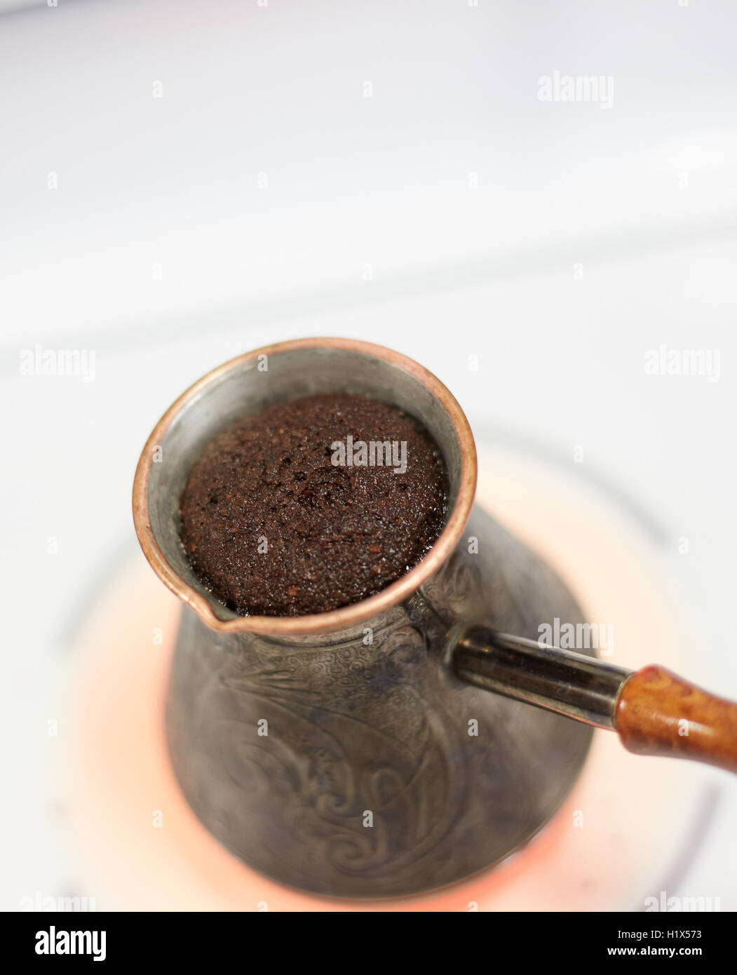 Food. Drinks. Brewing Turkish Coffee. Stove. Stock Photo