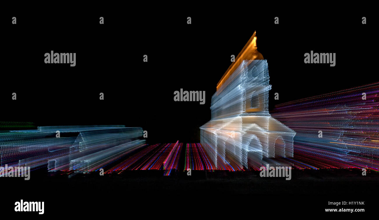 Lens zoom of church and christmas lights Stock Photo