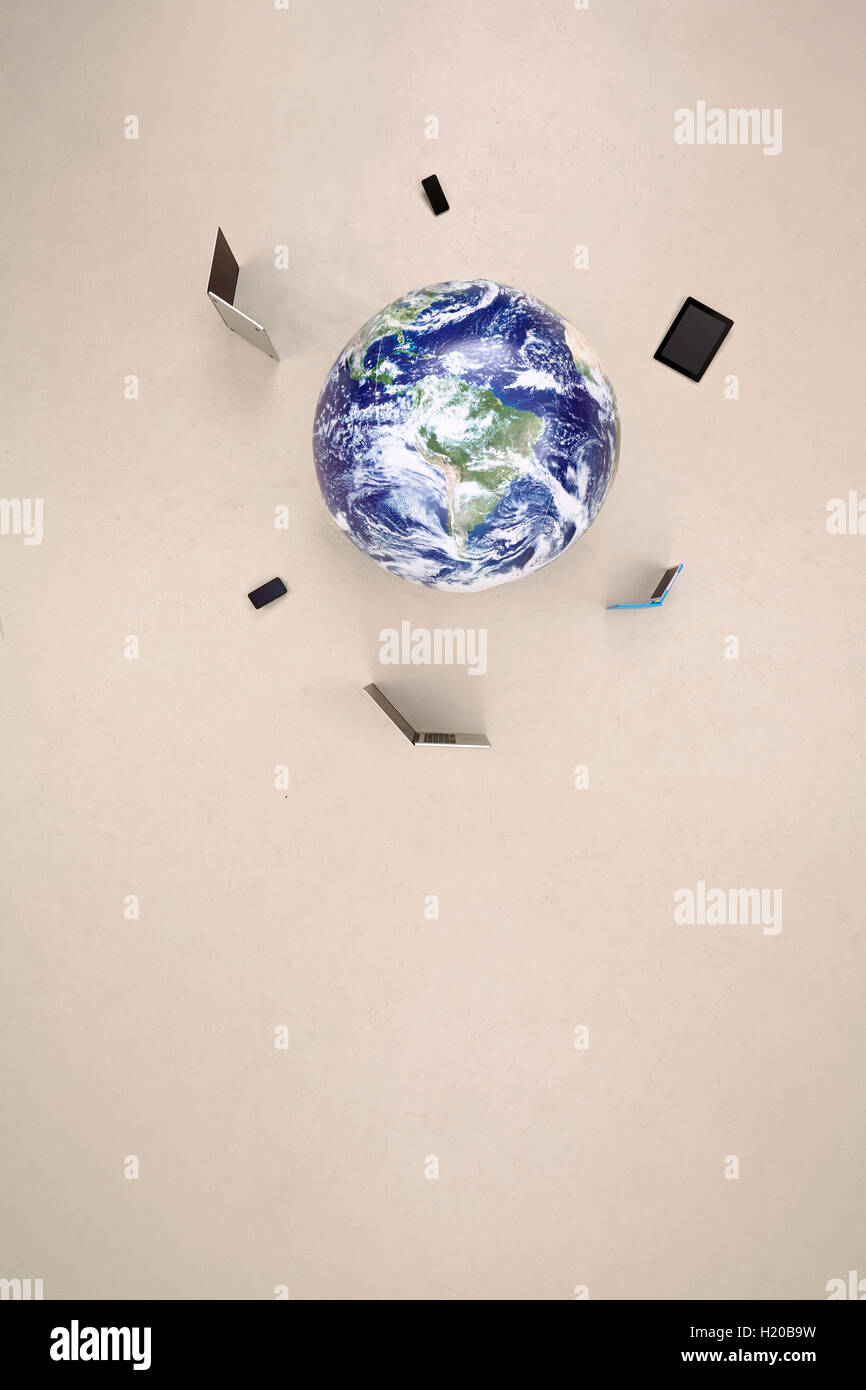 Globe with mobile devices Stock Photo Alamy