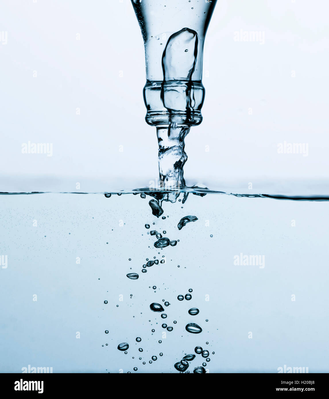 Mineral water pouring from bottle Stock Photo Alamy