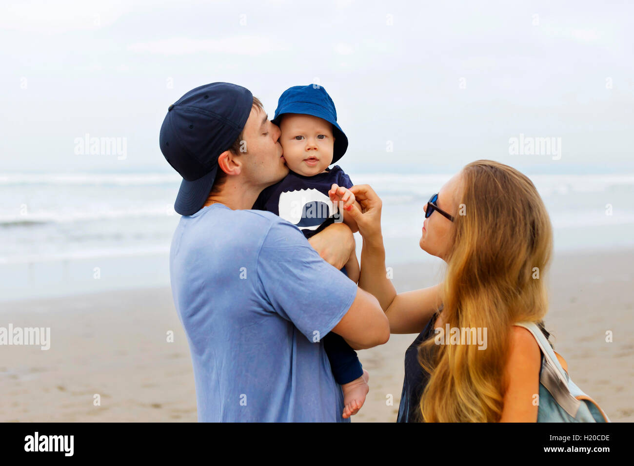Indonesia Bali Happy Parents With Baby At The Beach Stock Photo Alamy Indonesia Bali Happy Parents With Baby At The Beach Stock Photo Alamy