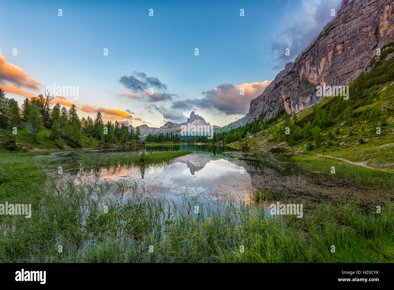 Italy, Veneto, Dolomites, Lake Federa and peak Becco di Mezzodi at sunset Stock Photo