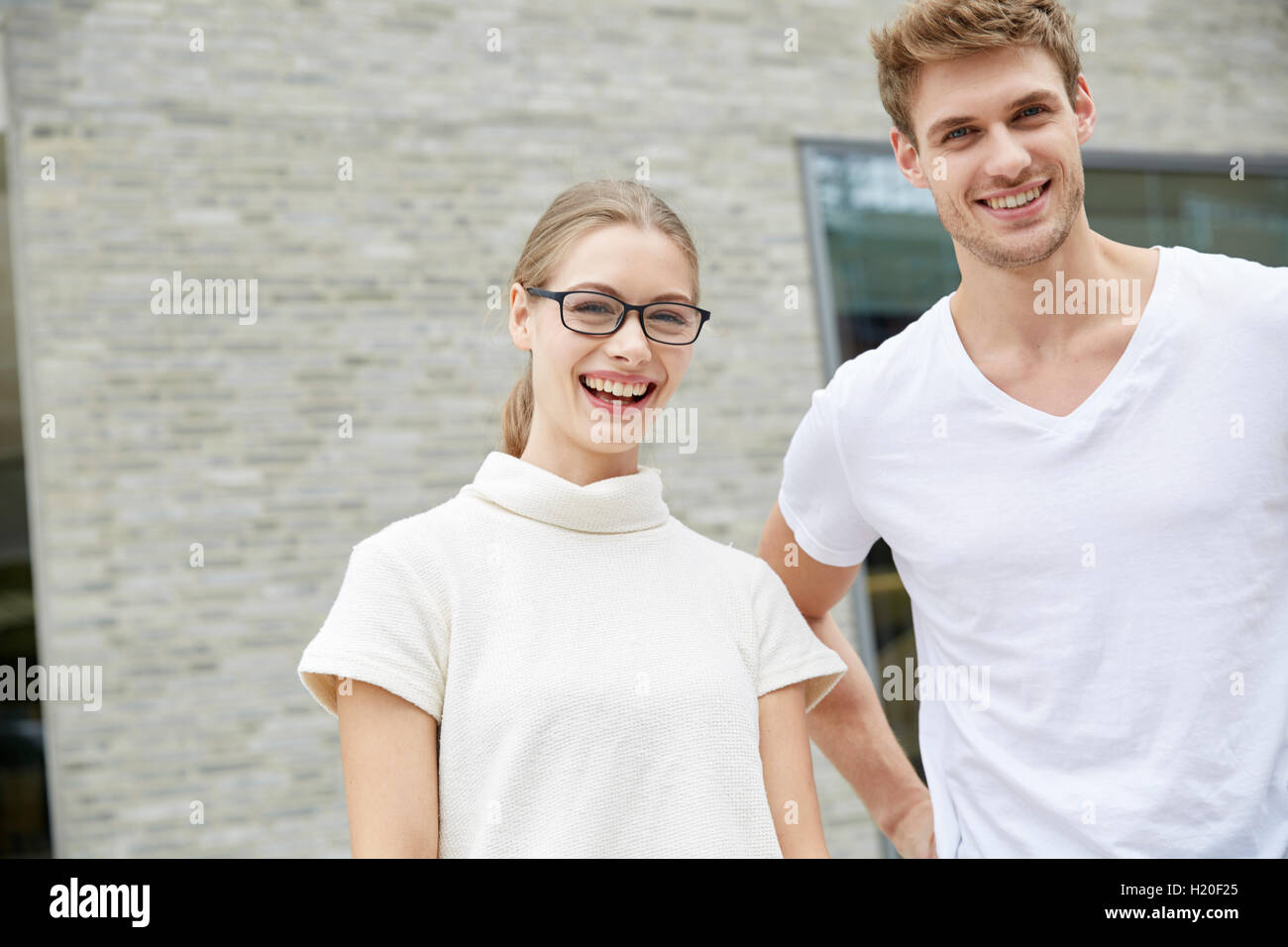 Portrait of young couple having fun Stock Photo - Alamy