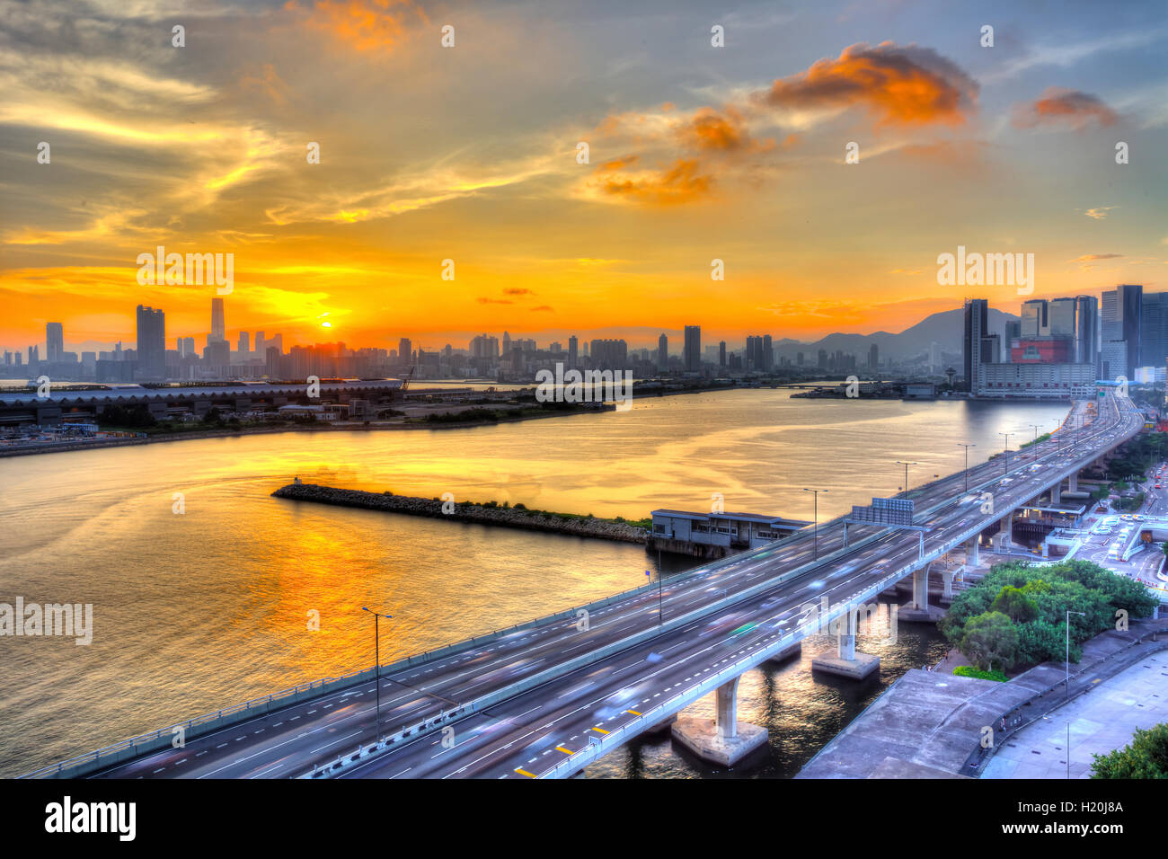 Sunset downtown in Hong Kong Stock Photo - Alamy