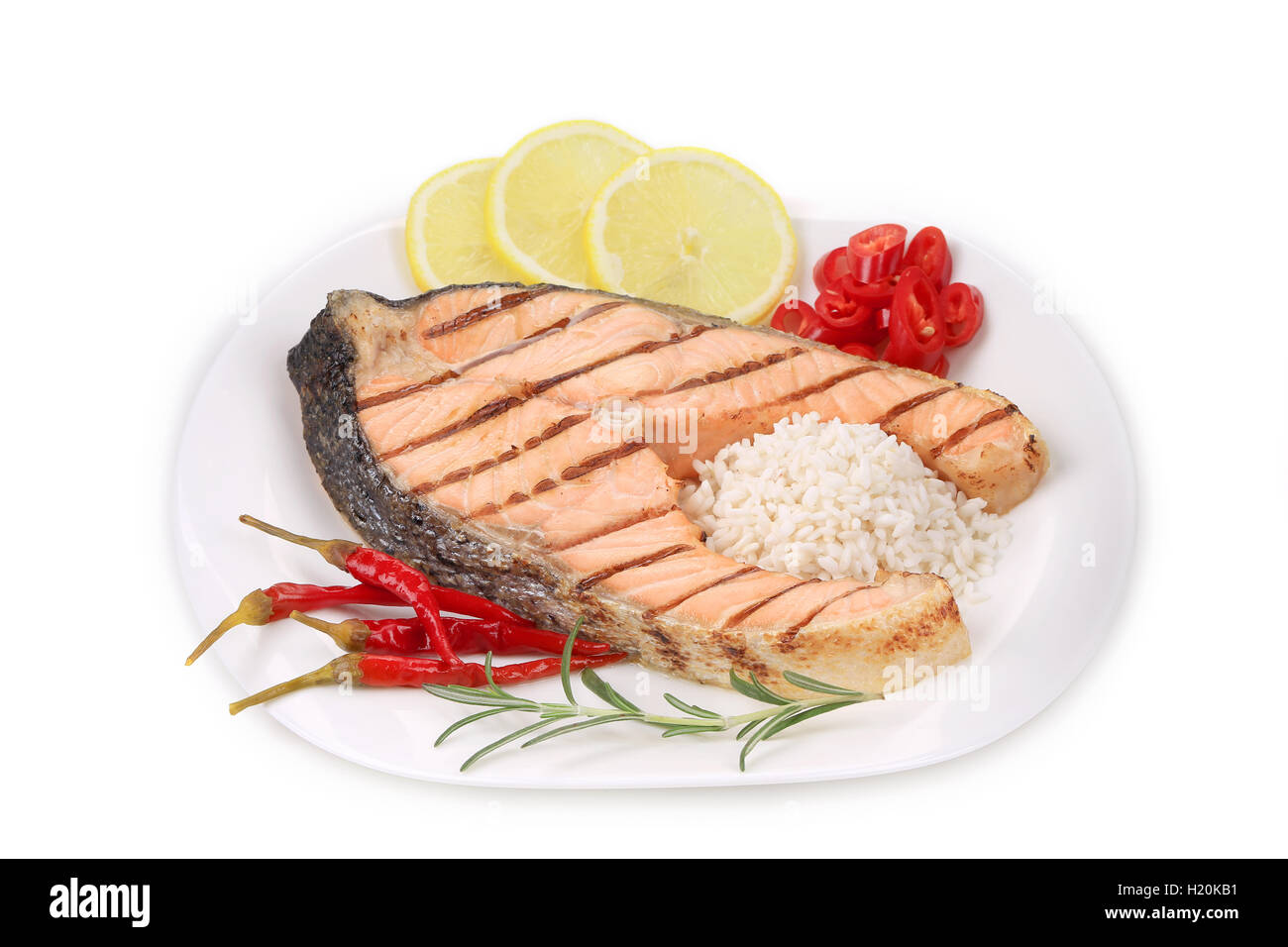 Grilled salmon steak with vegetables on plate Stock Photo - Alamy