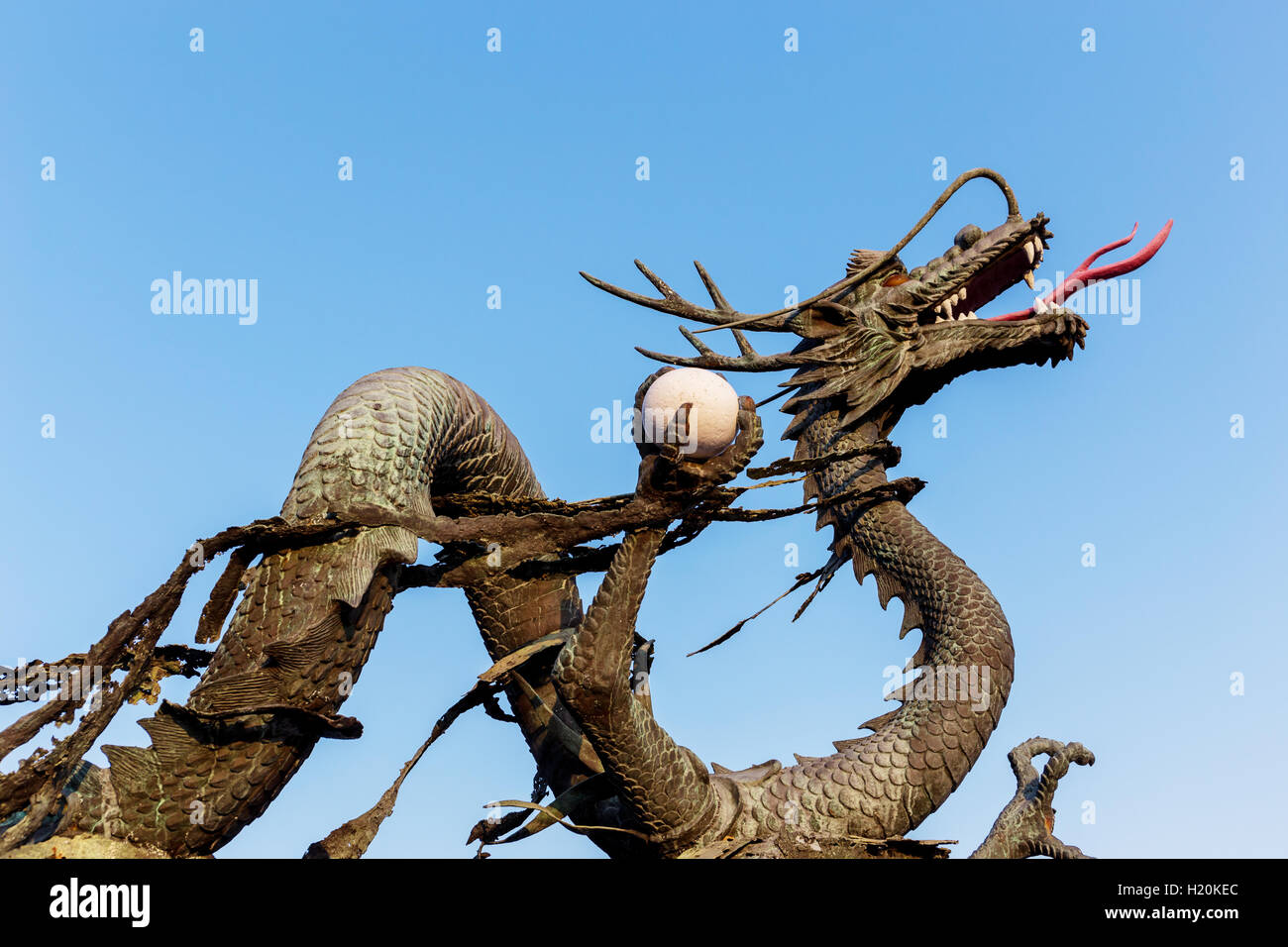 Concrete dragon statue Stock Photo - Alamy