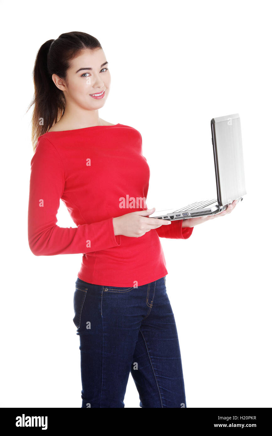 Young woman working on her laptop computer Stock Photo - Alamy