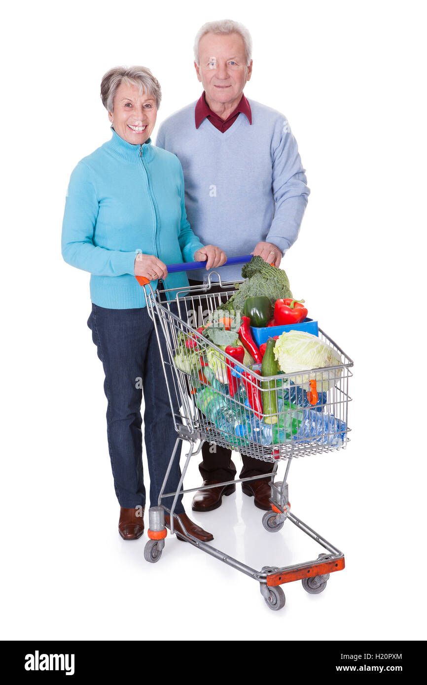 Old woman and shopping trolley hi-res stock photography and images - Alamy
