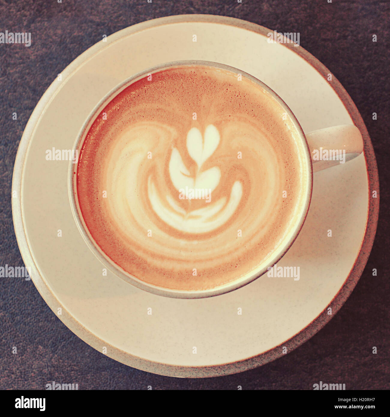 Cup of latte art coffee with retro filter effect Stock Photo Alamy
