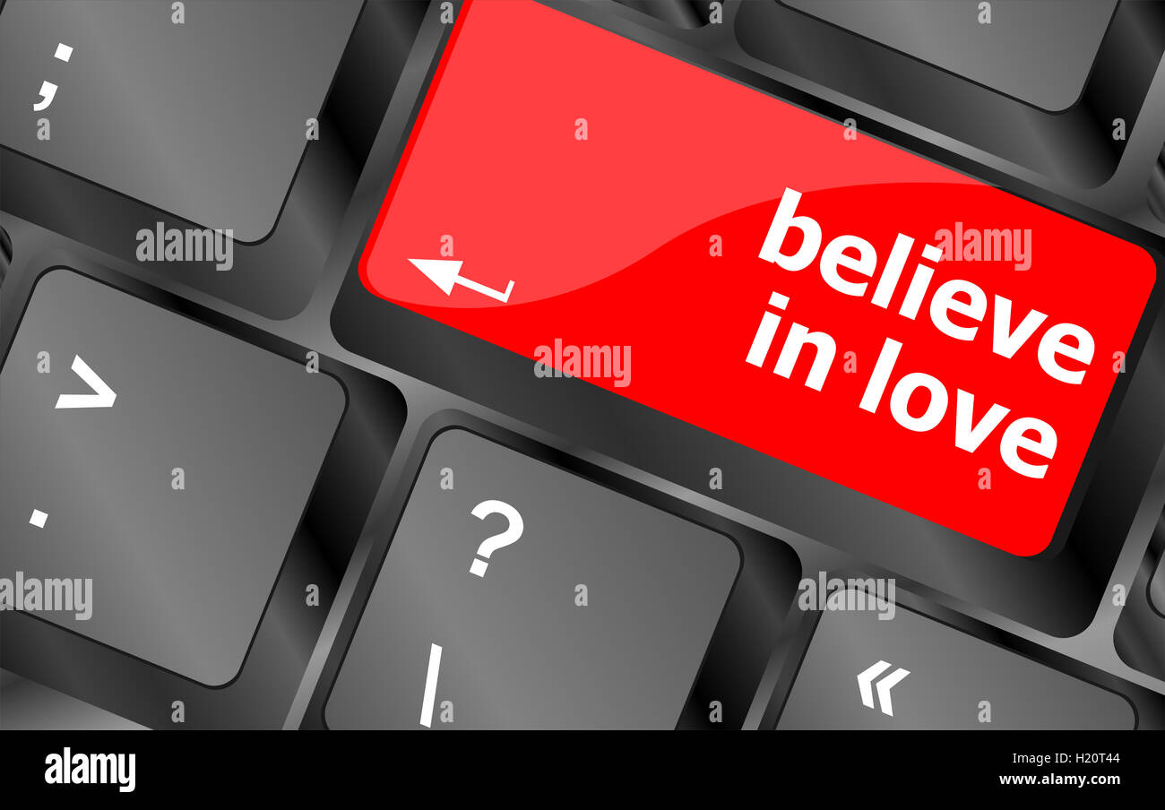 keyboard key with believe in love text and arrow Stock Photo