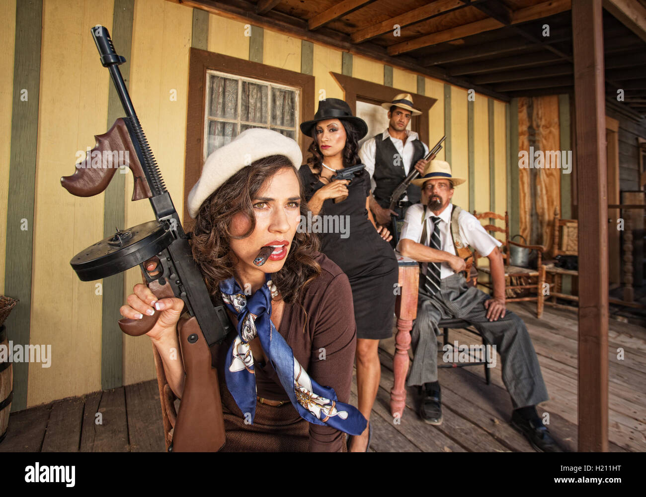 Tough Smoking Woman with Submachine Gun Stock Photo Alamy