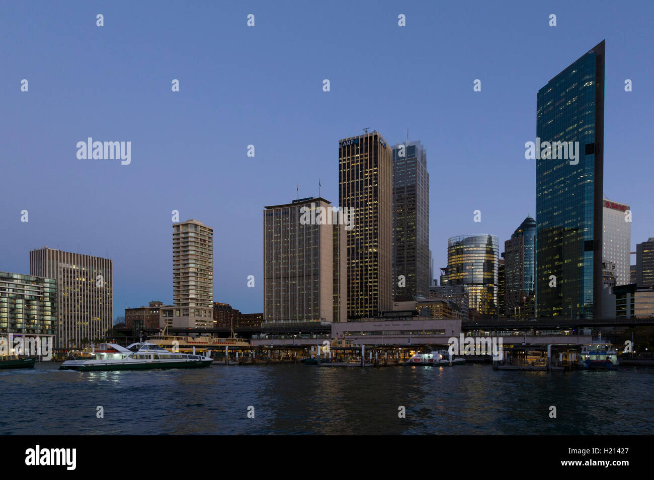 Sunset over the Ferry and Railway Terminals at Circular Quay Sydney Australia Stock Photo