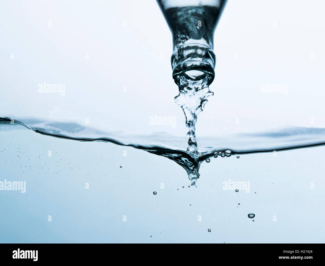 Mineral water pouring from bottle Stock Photo - Alamy