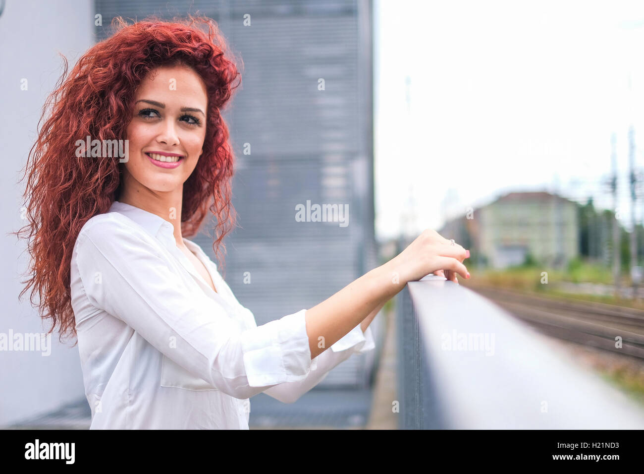 Portrait of redheaded young woman Stock Photo - Alamy