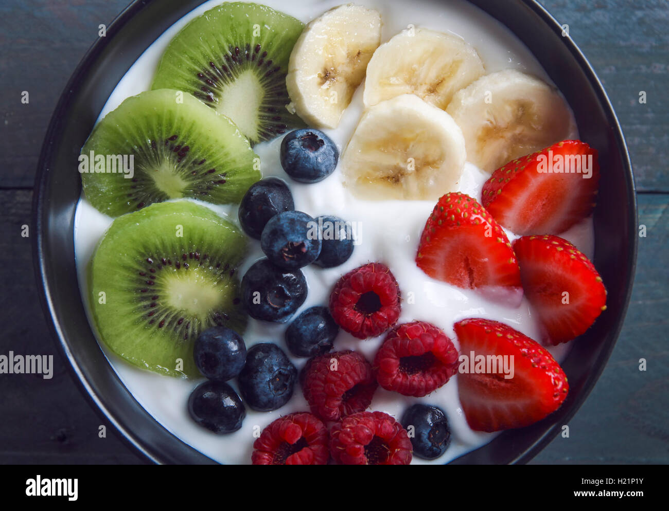 Bowl of natural yoghurt and different fresh fruits Stock Photo Alamy