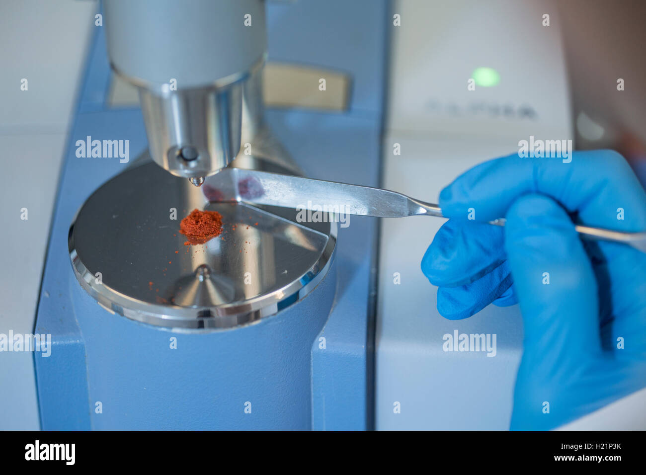 Examination of powder in lab Stock Photo Alamy