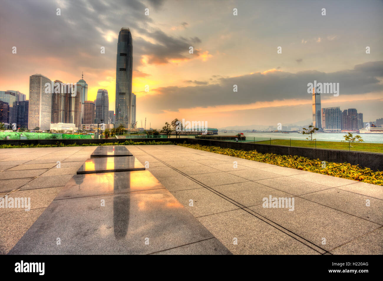 Hong Kong sunset in downtown Stock Photo - Alamy